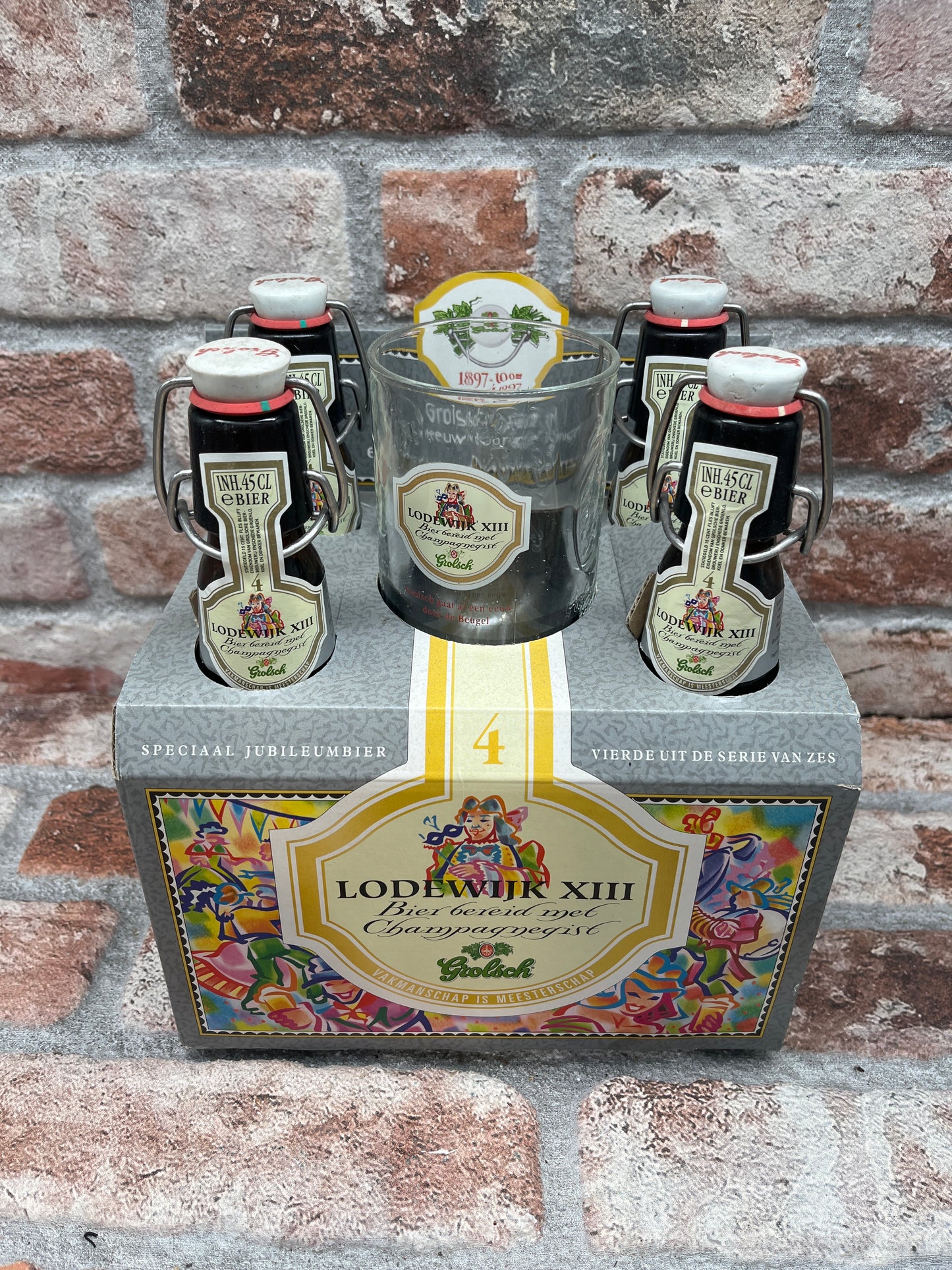 Grolsch Jubileumbier set 6 x 4 flessen plus 6 glazen ter ere van 100 jaar beugelfles 1997 - 44 CL